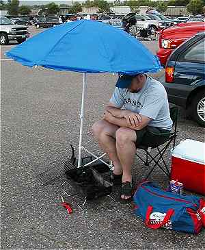 Photo of Kev under umbrella