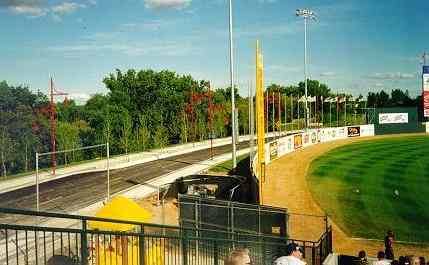 Photo of left field fence and beyond